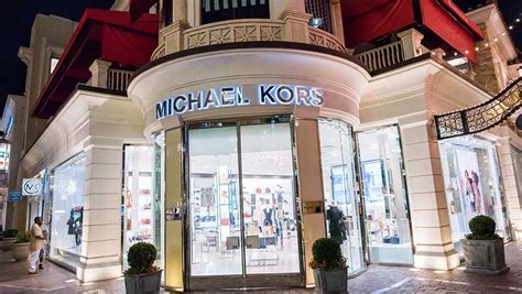 michael kors merger|michael kors scandal.